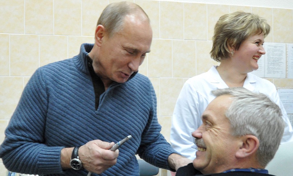 Prime Minister Vladimir Putin visits a local ambulance in Belgorod region
